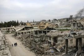 Một ngôi làng tại thị trấn Kobane, Syria bị phá hủy ngày 27/3/2015. (Nguồn: AFP/TTXVN)