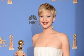Diễn viên Jennifer Lawrence đã giành giải Nữ diễn viên phụ xuất sắc nhất trong bộ phim "American Hustle" tại Lễ trao giải thưởng Quả cầu Vàng năm 2014. (Nguồn: AFP/TTXVN)
