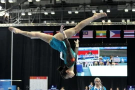 Vận động viên Phan Thị Hà Thanh (Việt Nam) thi đấu nội dung cầu thăng bằng. (Ảnh: Quốc Khánh/TTXVN)