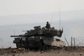 Xe quân sự của binh sỹ Israel tuần tra trên Cao nguyên Golan sau vụ phục kích ngày 27/11. (Nguồn: AFP/TTXVN)