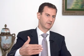 Tổng thống Syria Bashar Al-Assad trả lời phỏng vấn tại Damascus ngày 20/7. (Nguồn: EPA/TTXVN)
