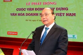 Thủ tướng Nguyễn Xuân Phúc đến dự và phát biểu tại Lễ phát động cuộc vận động xây dựng văn hóa doanh nghiệp. (Ảnh: Thống Nhất/TTXVN)