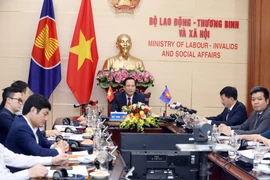 Hội nghị Bộ trưởng Lao động đặc biệt về Ứng phó với tác động của dịch bệnh COVID-19 đối với lao động và việc làm tại điểm cầu Hà Nội. (Ảnh: Anh Tuấn/TTXVN)