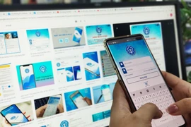 Truy cập ứng dụng Bảo hiểm xã hội số. (Ảnh: PV/Vietnam+)