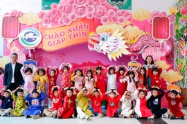 Trong không khí Tết Nguyên đán cận kề, các trường học ở Hà Nội đã có nhiều hoạt động trải nghiệm thú vị cho học sinh. (Ảnh: PV/Vietnam+).