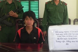 Đối tượng Nông Văn Dẫn bị bắt giữ tại Đồn Biên phòng cửa khẩu Lý Vạn, huyện Hạ Lang, Cao Bằng. (Ảnh: Quốc Đạt/TTXVN)
