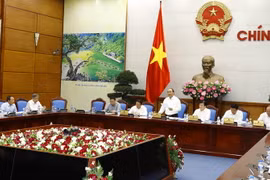 Thủ tướng Nguyễn Xuân Phúc, Chủ tịch Ủy ban Quốc gia về biến đổi khí hậu chủ trì cuộc họp lần thứ 8 về biến đổi khí hậu. (Ảnh: Thống Nhất/TTXVN)