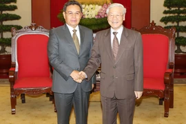 Tổng Bí thư Nguyễn Phú Trọng tiếp Chủ tịch Ủy ban Trung ương Mặt trận Lào xây dựng đất nước Saysomphone Phomvihane. (Ảnh: Trí Dũng/TTXVN)