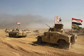 Các lực lượng Iraq tiến vào làng al-Ayadieh, phía bắc khu vực Tal Afar trong chiến dịch giải phóng khu vực này từ phiến quân IS ngày 28/8. (Nguồn: AFP/TTXVN)