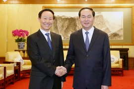 Chủ tịch nước Trần Đại Quang tiếp đồng chí Vương Gia Thuỵ, Phó Chủ tịch Chính hiệp Trung Quốc tới chào xã giao. (Ảnh: Nhan Sáng/TTXVN)
