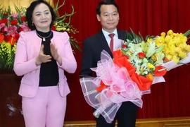 Tân Chủ tịch HĐND tỉnh Yên Bái Phạm Thị Thanh Trà (trái) và tân Chủ tịch UBND tỉnh Yên Bái Đỗ Đức Duy. (Ảnh: Thế Duyệt/TTXVN)