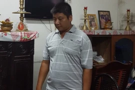 Nguyên Phó Chánh thanh tra giao thông vận tải ông Bùi Văn Minh bị bắt về hành vi nhận hối lộ. (Ảnh: Thanh Sang/TTXVN)