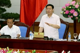 Phó Thủ tướng Chính phủ Vương Đình Huệ chủ trì hội thảo. (Ảnh: Nguyễn Dân/TTXVN)