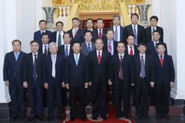 Đoàn đại biểu cấp cao Hội đồng Lý luận Trung ương Đảng Cộng sản Việt Nam và Hội đồng Khoa học Xã hội Quốc gia Lào. (Ảnh: Phương Hoa/TTXVN)