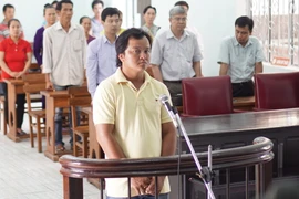 Bị cáo Ngô Tấn Thảo tại phiên tòa. (Ảnh: Hải Âu/TTXVN)