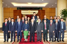 Tổng Bí thư Nguyễn Phú Trọng với các đại biểu. (Ảnh: Trí Dũng/TTXVN)