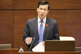 Bộ trưởng Bộ Văn hóa, Thể thao và Du lịch Nguyễn Ngọc Thiện trả lời chất vấn của Đại biểu Quốc hội. (Ảnh: Phương Hoa/TTXVN)