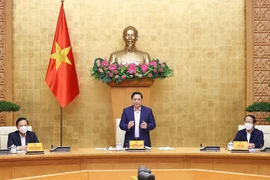 Thủ tướng Phạm Minh Chính chủ trì họp Ban Chỉ đạo Quốc gia phòng, chống dịch COVID-19 với các tỉnh, thành phố. (Ảnh: Dương Giang/TTXVN)