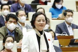 Bộ trưởng Bộ Nội vụ Phạm Thị Thanh Trà giải trình ý kiến của đại biểu Quốc hội. (Ảnh: Phương Hoa/TTXVN)