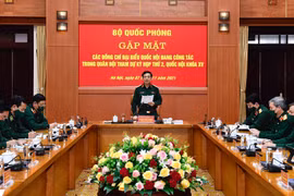 Các đại biểu tham dự buổi gặp mặt. (Nguồn: Nhandan.vn)