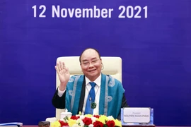Chủ tịch nước Nguyễn Xuân Phúc tại điểm cầu Hà Nội. (Ảnh: Thống Nhất/TTXVN)