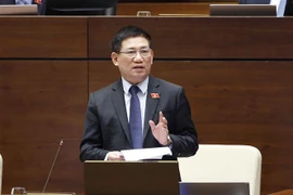 Bộ trưởng Bộ Tài chính Hồ Đức Phớc phát biểu giải trình, làm rõ một số vấn đề đại biểu Quốc hội nêu. (Ảnh: Doãn Tấn/TTXVN)