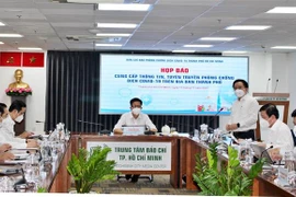 Họp báo thông tin phòng, chống dịch trên địa bàn Thành phố Hồ Chí Minh ngày 15/11. (Ảnh: Xuân Anh/TTXVN)