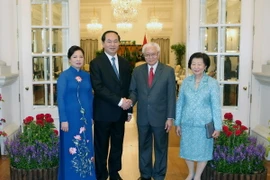 Chủ tịch nước Trần Đại Quang và Phu nhân cùng với Tổng thống Singapore Tony Tan và Phu nhân. (Ảnh: Nhan Sáng/TTXVN)