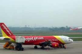 Máy bay của Vietjet Air đi từ sân bay quốc tế Nội Bài (Hà Nội). (Ảnh: Huy Hùng/TTXVN)