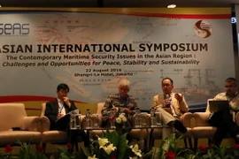 Các học giả tại hội thảo. (Ảnh: Trần Chiến/Vietnam+)