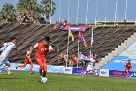 Trận đấu khai mạc giữa U22 Việt Nam và U22 Myanmar trong khuôn khổ giải bóng đá BIDC Cup 2013. (Ảnh: Trần Chí Hùng/Vietnam+)