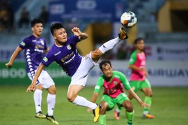 Tiền vệ Quang Hải có chỉ số hàm lượng mỡ trong cơ thể tốt nhất đội tuyển Việt Nam. (Ảnh: Hiển Nguyễn/Vietnam+) 