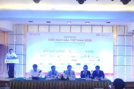 Họp báo thông tin về Diễn đàn M&A Việt Nam 2015 (Ảnh: PV/Vietnam+)