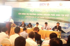 Hội thảo “Vận hành thị trường chứng khoán phái sinh Việt Nam” (Ảnh: PV/Vietnam+)