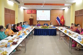 Lễ kỷ niệm Ngày Quốc tế Phụ nữ được tổ chức trong khuôn viên Đại sứ quán Việt Nam tại Thái Lan. (Ảnh: Huy Tiến/TTXVN)