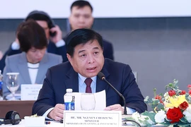 Bộ trưởng Bộ Kế hoạch và Đầu tư Nguyễn Chí Dũng phát biểu khai mạc diễn đàn. Ảnh: Dương Giang-TTXVN