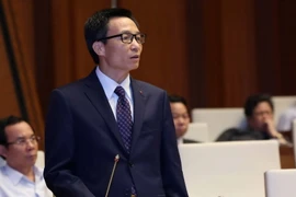 Phó Thủ tướng Vũ Đức Đam trả lời chất vấn. (Ảnh: Phương Hoa/TTXVN) 