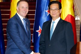 Thủ tướng Nguyễn Tấn Dũng đón, tiếp Thủ tướng New Zealand John Key. (Ảnh: Đức Tám/TTXVN)