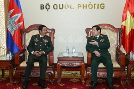 Đại tướng Phùng Quang Thanh tiếp Đại tướng Kun Kin, Phó Chủ tịch kiêm Tổng Thư ký Hội Cựu chiến binh Hoàng gia Campuchia. (Ảnh: Minh Khánh/TTXVN phát)