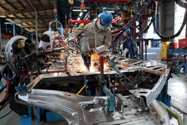 Sản xuất ôtô tại Nhà máy ôtô Ford Hải Dương, đơn vị có mức tăng trưởng khá, đóng góp lớn cho ngân sách. (Ảnh: Trần Việt/ TTXVN)