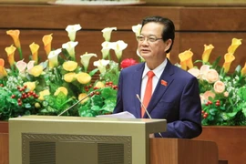 Thủ tướng Nguyễn Tấn Dũng trình bày báo cáo trước Quốc hội. (Ảnh: Doãn Tấn/TTXVN) 