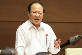 Bộ trưởng Bộ Văn hóa, Thể thao và Du lịch Hoàng Tuấn Anh trả lời câu hỏi chất vấn của đại biểu Quốc hội. (Ảnh: Doãn Tấn/TTXVN)