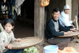 Cuộc sống dần ổn định với người dân ở bản Mường Toong 4. (Ảnh: Xuân Tư/TTXVN)