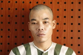 Đối tượng Nguyễn Văn Thắng bị công an tạm giữ để điều tra. (Ảnh: Nguyễn Văn Việt/TTXVN)