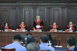 Chánh án Tòa án nhân dân Tối cao Nguyễn Hòa Bình, Chủ tọa phiên tòa phát biểu khai mạc phiên xét xử. (Ảnh: Doãn Tấn/TTXVN)