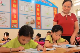 Học sinh thôn Làng Nủ, xã Phúc Khánh, huyện Bảo Yên, tỉnh Lào Cai. (Ảnh: Hoàng Hiếu/TTXVN)