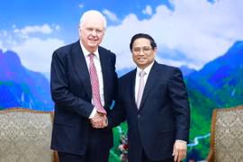 Thủ tướng Phạm Minh Chính tiếp Chủ tịch Hội đồng Tín thác Đại học Fulbright Việt Nam. (Ảnh: Dương Giang/TTXVN)