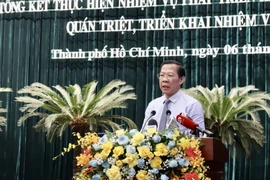 Ông Phan Văn Mãi, Chủ tịch Ủy ban Nhân dân Thành phố Hồ Chí Minh phát biểu tại hội nghị. (Ảnh: Xuân Anh/TTXVN)