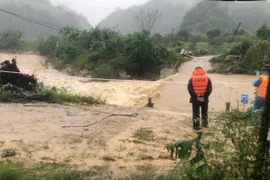 Khu vực cầu tràn qua suối Mon thuộc bản Áng, xã Đông Sang, huyện Mộc Châu, tỉnh Sơn La, nước lũ dâng lên cao khiến 2 người bị nước cuốn trôi. (Ảnh: TTXVN phát)