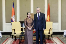 Chủ tịch nước Tô Lâm với Chủ tịch Hội Hữu nghị Campuchia-Việt Nam Men Sam An. (Ảnh: Nhan Sáng/TTXVN)
